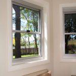 Glass windows on white walls