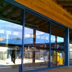 Glass walls installed on wooden walls
