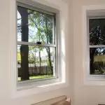 Glass windows on white walls